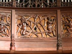 06B Muses playing musical instruments carved into the wood below the pipe organ in the concert auditorium Palau de la Musica Catalana Barcelona Spain