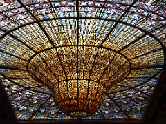 09B The huge stained glass drip-shaped skylight which illuminates the concert auditorium from the upper level Palau de la Musica Catalana Barcelona Spain