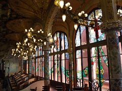 10A The upper seating area with the ceiling and stained glass windows Palau de la Musica Catalana Barcelona Spain