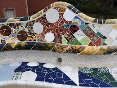 05C The main square is surrounded by a long bench in the form of a sea serpent in trencadis mosaic tiles Park Guell Barcelona Spain