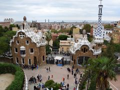 08A The main entrance with the gingerbread-like Casa del Guarda Porters Lodge left and the Porters Residence right Park Guell Barcelona Spain