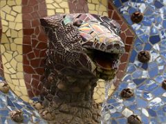 14B Snake trencadis mosaic fountain on the entrance steps Park Guell Barcelona Spain