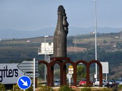 01C Monument to cava called The Return of the Grape with a bottle flowing over at roundabout on BP-2427 Sant Sadurni Penedes wine tour Cavas Codorniu Near Barcelona Spain