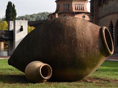 06B Huge and small wine pottery jugs on the grounds of Cavas Codorniu Penedes wine tour near Barcelona Spain