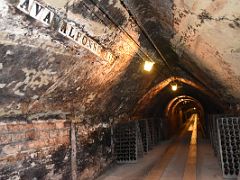 10B A cellar tunnel is marked Alfonso XIII, The King of Spain, who visited the winery for a banquet in his honour in 1904 Codorniu Penedes wine tour near Barcelona Spain