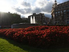 02B A fountain is surrounded by statues in Placa Catalunya Barcelona Spain