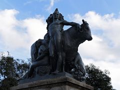 09 Girona by Antoni Parera 1928 An Ox, bearing harvest produce, and accompanied by four people as an allegory of the provinces of Catalonia in Placa Catalunya Barcelona Spain