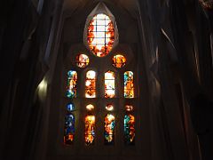 18C Colourful Stained Glass Windows above the Virgin Mary statue Sagrada Familia Barcelona Spain