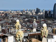 26A Colourful trencadis mosaics and east view includes Torre Glories, a 38-story skyscraper designed by French architect Jean Nouvel Passion Tower Sagrada Familia Barcelona Spain