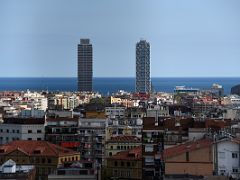 27A Torre Mapfre and Hotel Arts skyscrapers were built for the 1992 Olympic Games next to the Port Olímpic marina from Passion Tower Sagrada Familia Barcelona Spain