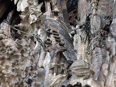 03B Two angels blow trumpets Faith portico Nativity facade Sagrada Familia Barcelona Spain