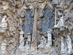 04C Chorus of angels playing musical instruments Charity portico Nativity facade Sagrada Familia Barcelona Spain