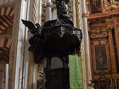 03A The Carved Wooden Pulpit next to the main altar Mezquita Mosque Cathedral Cordoba Spain