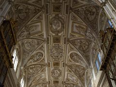 05A Ornate Ceiling above the choir stalls with the Episcopal throne and Mezquita Mosque Cathedral Cordoba Spain