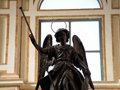 06D Archangel Raphael Sculpture Sits at the top of the Episcopal throne in the choir stalls Mezquita Mosque Cathedral Cordoba Spain