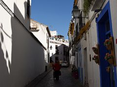 07B A Car Navigates The Narrow Streets Of The Old Town Cordoba Spain