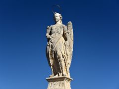 02 Sculpture Of St Raphael by Bernabe Gomez del Rio in 1651 Roman Bridge Cordoba Spain