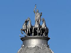 03B Aurora Roman goddess of dawn drives a Quadriga 4-horse chariot by Juan Adsuara 1920 On Top Of Edificio de Seguros La Aurora Near The Plaza de Cibeles Madrid Spain