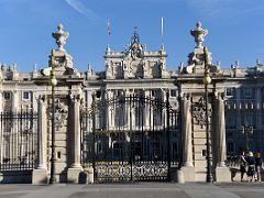 01C Ornate Entrance Gate With Clock Tower Behind From Plaza de la Armería For Royal Palace Madrid Spain