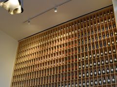 04C Seating Area With Wine Wall Behind In Bar Area Marques de Riscal Frank Gehry 2006 Spain