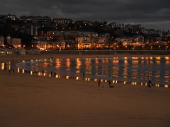 03D People Stroll On La Concha Beach At Night San Sebastian Donostia Spain